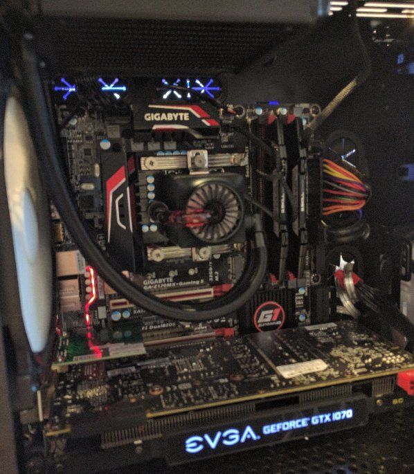 A computer with a gigabyte motherboard and a evga graphics card