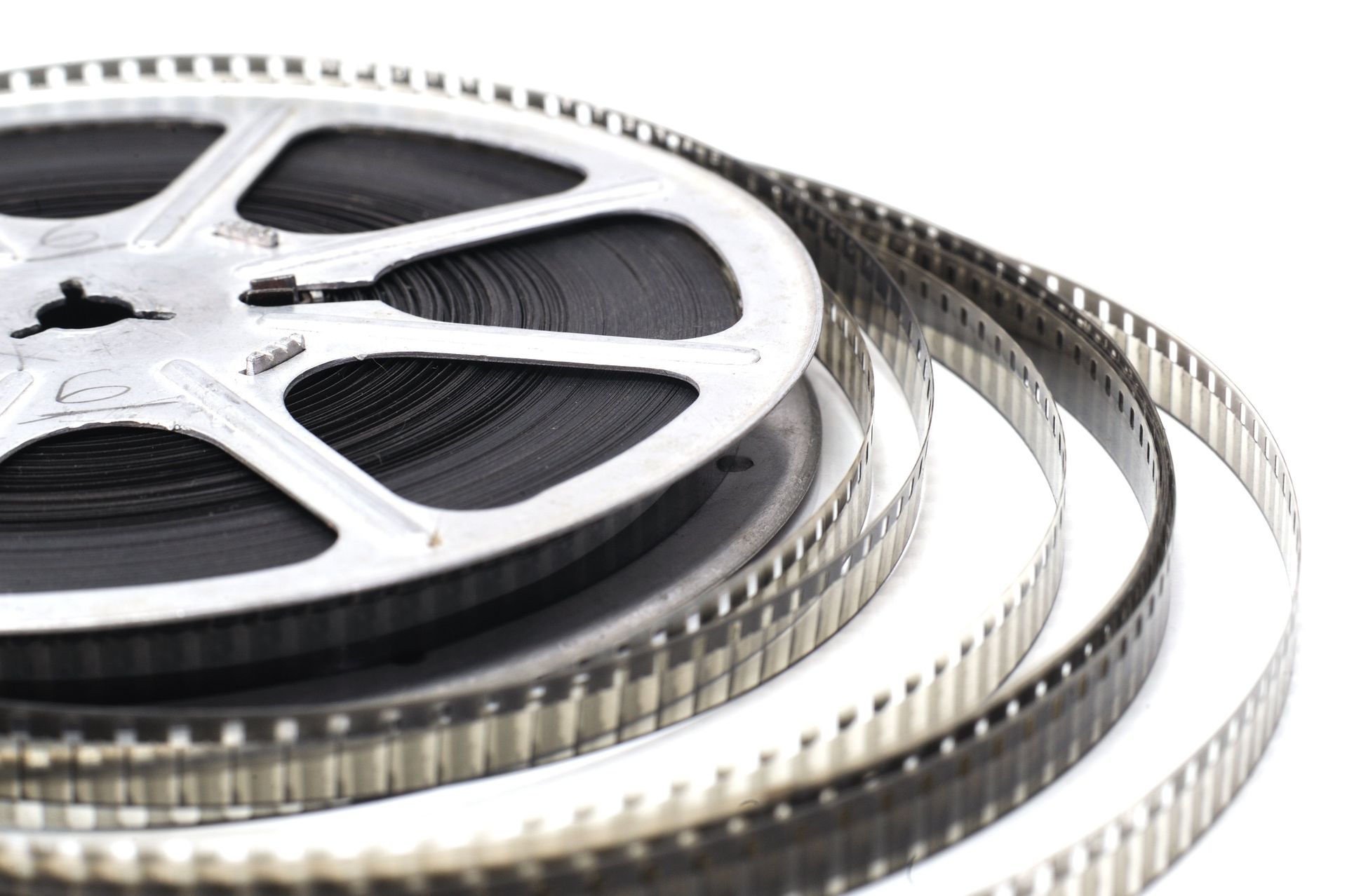 Three rolls of film are stacked on top of each other