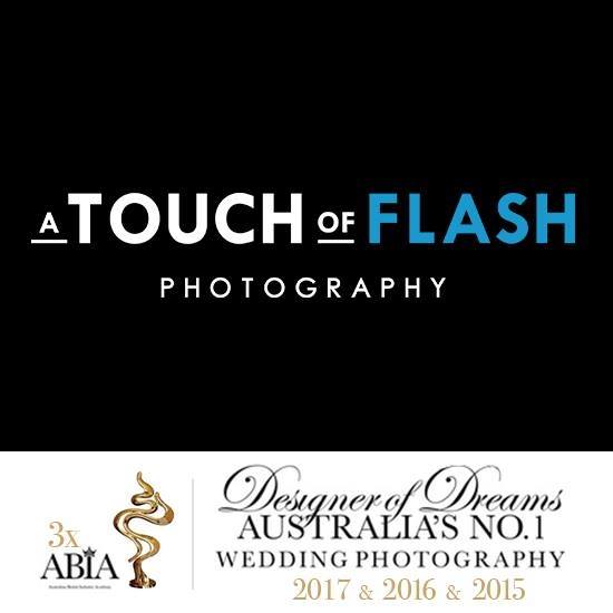 The logo for a touch of flash photography is on a black background.