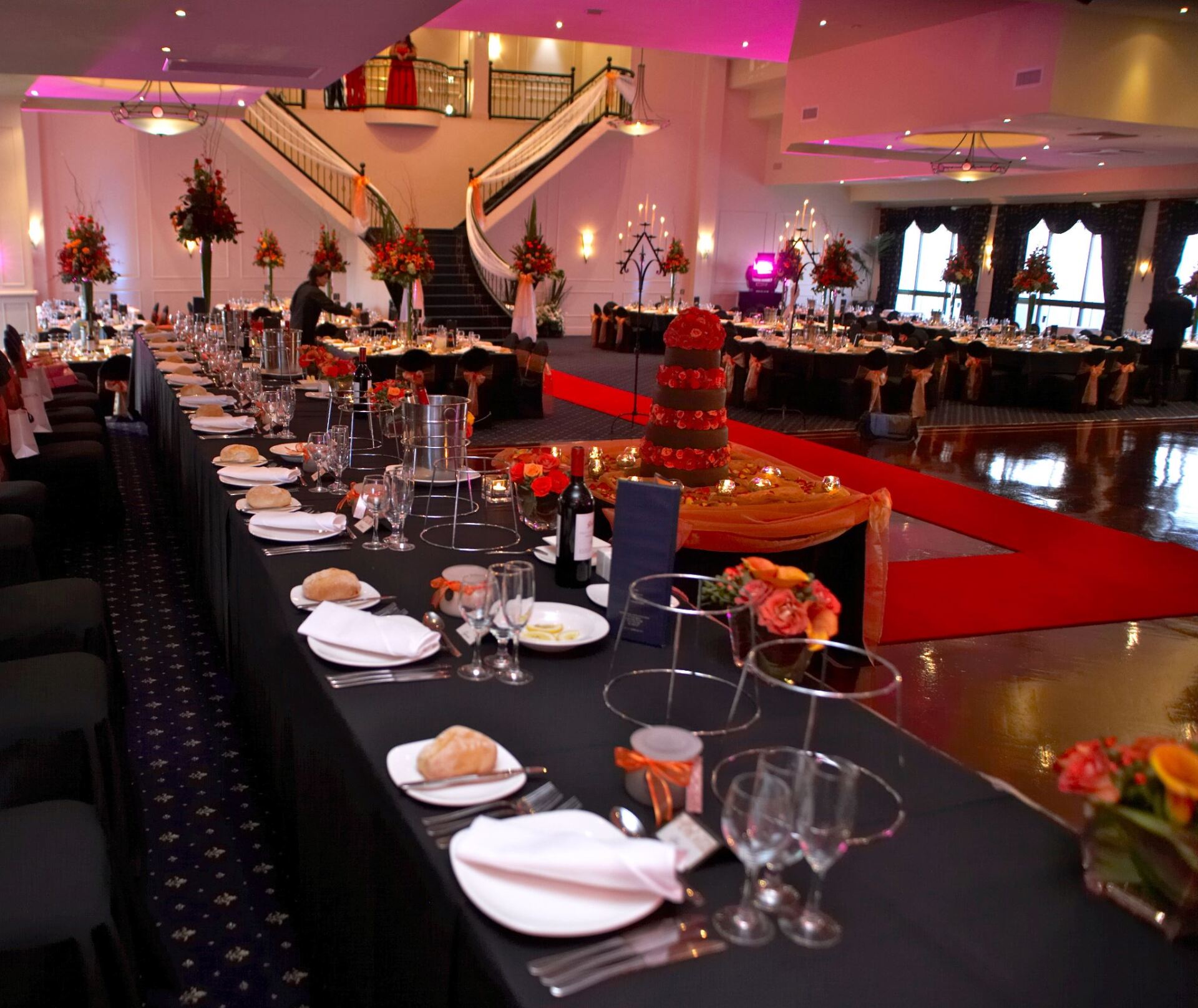 A long table with a cake on top of it