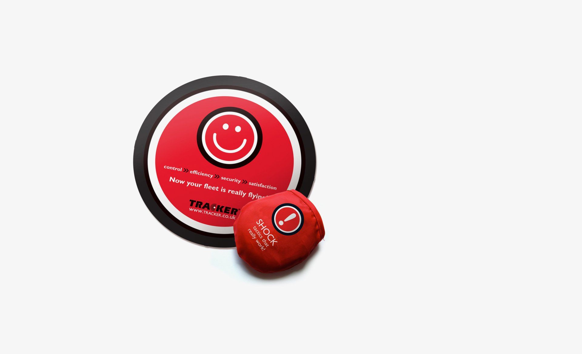 A red circle with a smiley face on it
