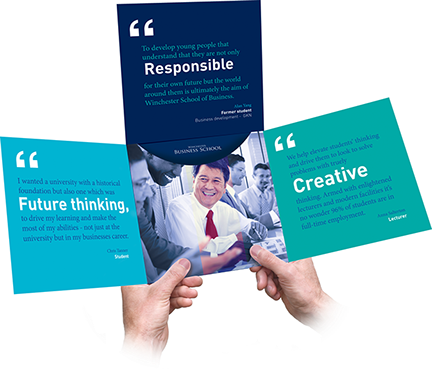 A person is holding a brochure that says responsible future thinking and creative