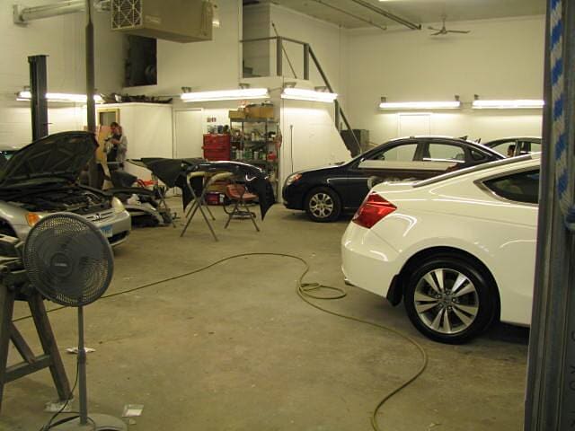 Cars in a shop - Auto body shop in Springfield, MA