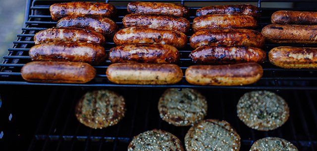 grilled hotdog and patties