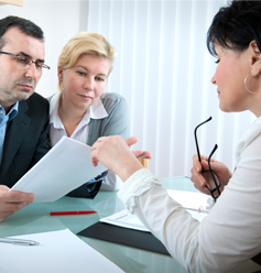 Couple with Insurance Adviser