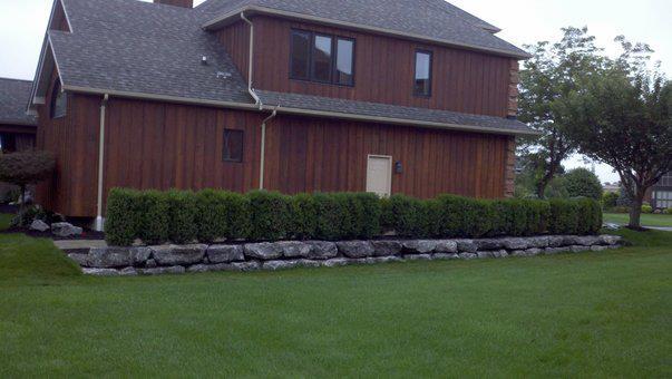 a large house with a large lawn in front of it