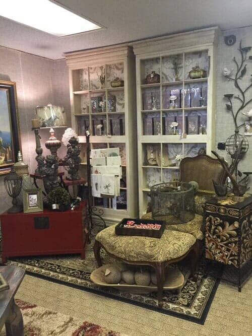 Bookcases made with antique window panes showcasing our Jardin de Rochelle Aroma Porcelain Diffusers — Decorative Items in Baytown, TX