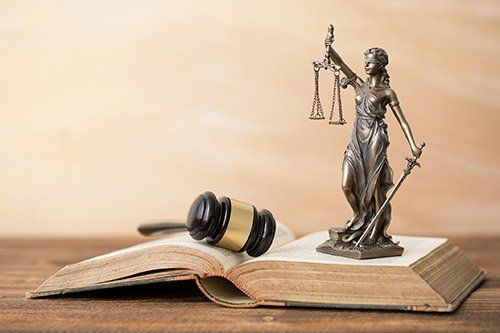Justice statue, gavel, book. Justice statue, gavel, book.