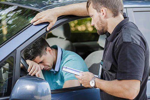 Traffic vViolations — Man in Car Fined by Police Officer in Massillon, OH Traffic vViolations — Man in Car Fined by Police Officer in Massillon, OH