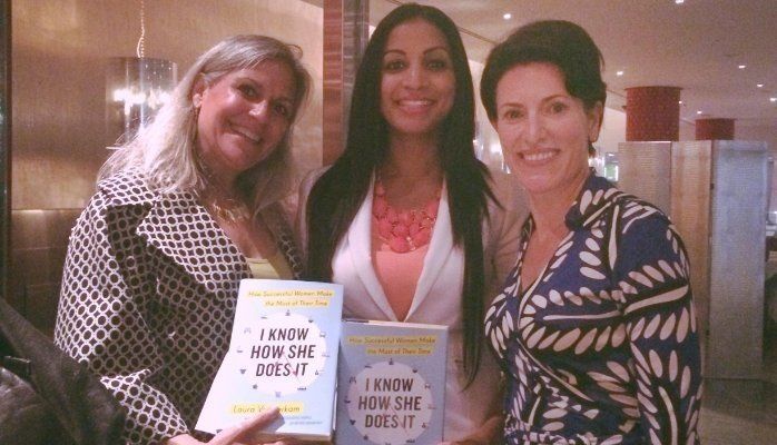 a woman holding a book that says i know how she does it
