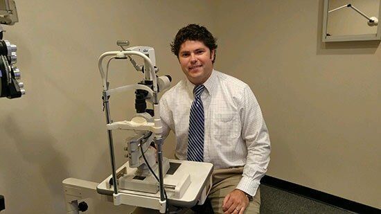 Optician Dr. Reach getting ready to peform a routine eye exam - professional eye care services in Knoxville, TN Optician Dr. Reach getting ready to peform a routine eye exam- professional eye care services in Knoxville, TN