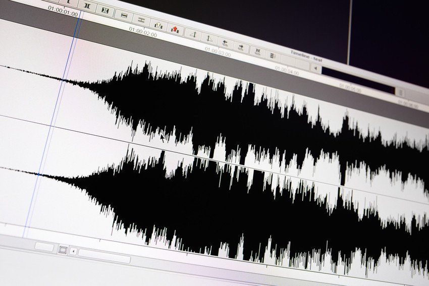 Timeline window with black sound waveform in the film editing soft