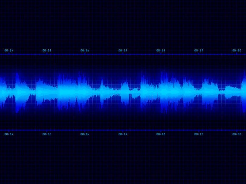 Blue sound wave against black background