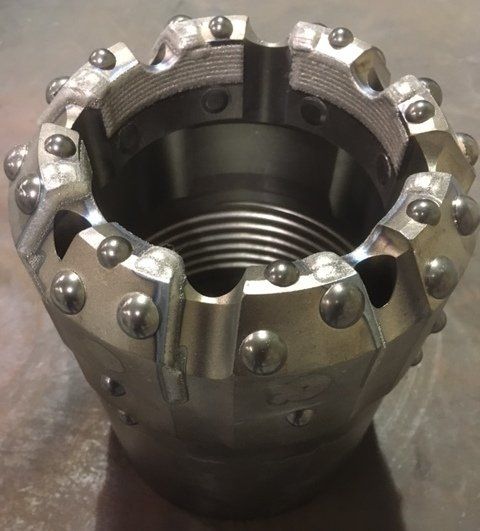A close up of a metal object on a table
