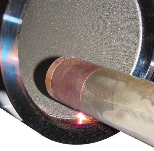 A close up of a metal object with a light coming out of it