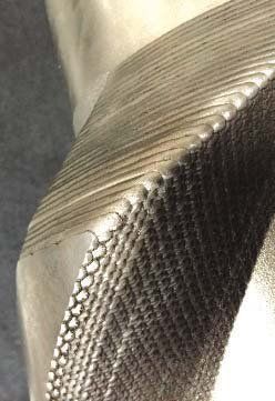 A close up of a piece of metal on a table.