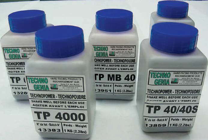 Four bottles of tp 4000 and tp 40/403 are on a table