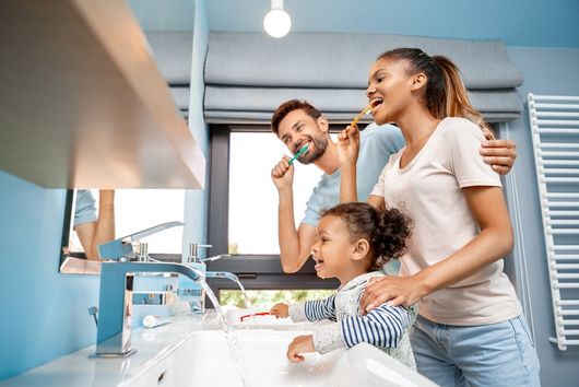 Family Brushing Their Teeth — Lebanon, OH — Family Dental Care of Lebanon Travis Clark. DDS