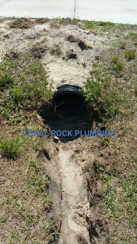Culvert reinstatement, and re sod driveway to prevent concrete cracking. Culvert Cleaning, Culvert repair, Plumber Palm Bay Melbourne FL