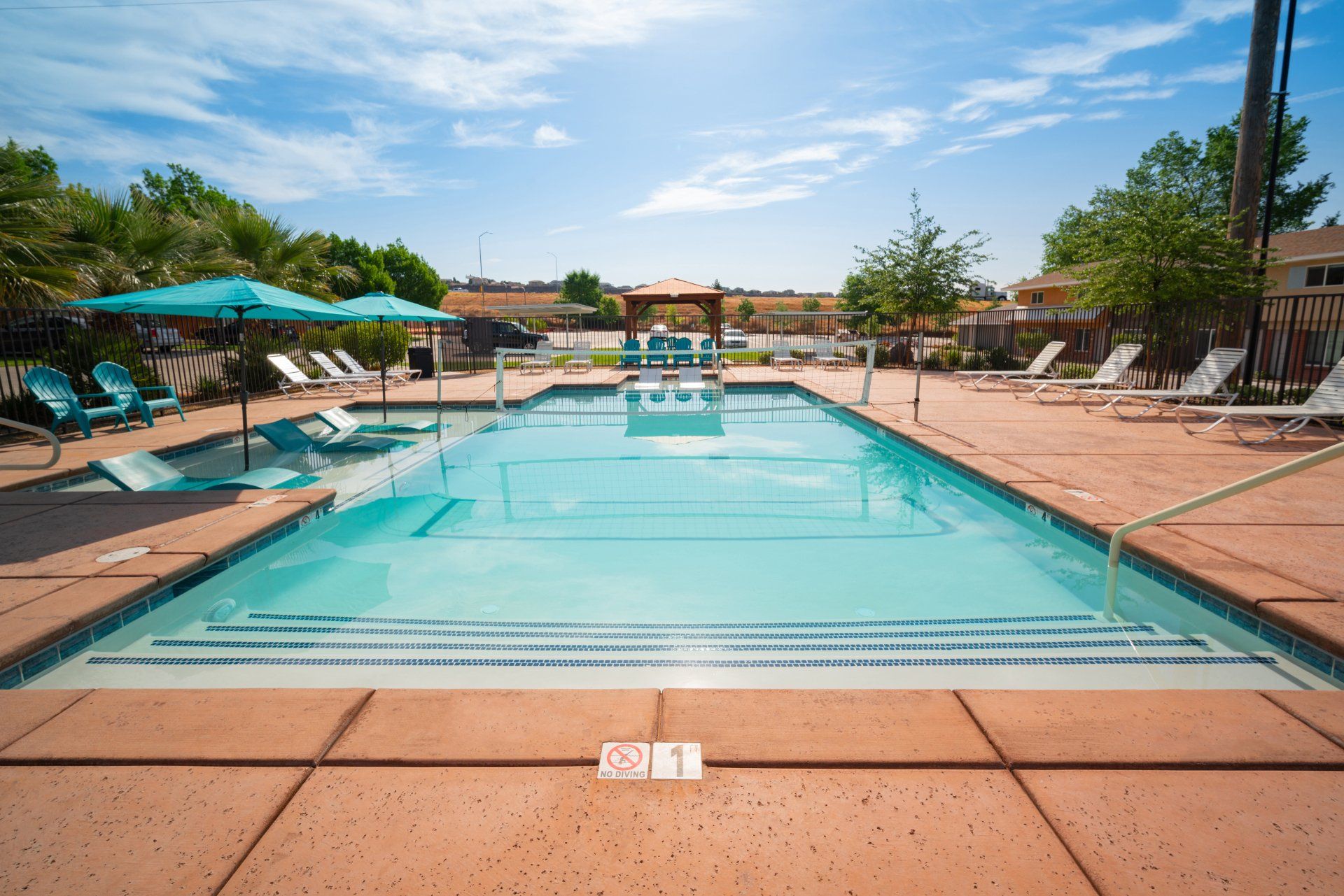 The Stay student housing in St. George offers Utah Tech off-campus housing with large private and shared bedrooms. Features in-unit laundry, a pool with a lounge deck, and common areas for socializing. Ideal off-campus housing in St. George for students.
