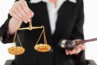 Holding Scales – Workers' Compensation Attorneys in Wilimington. DE Holding Scales – Workers' Compensation Attorneys in Wilimington. DE
