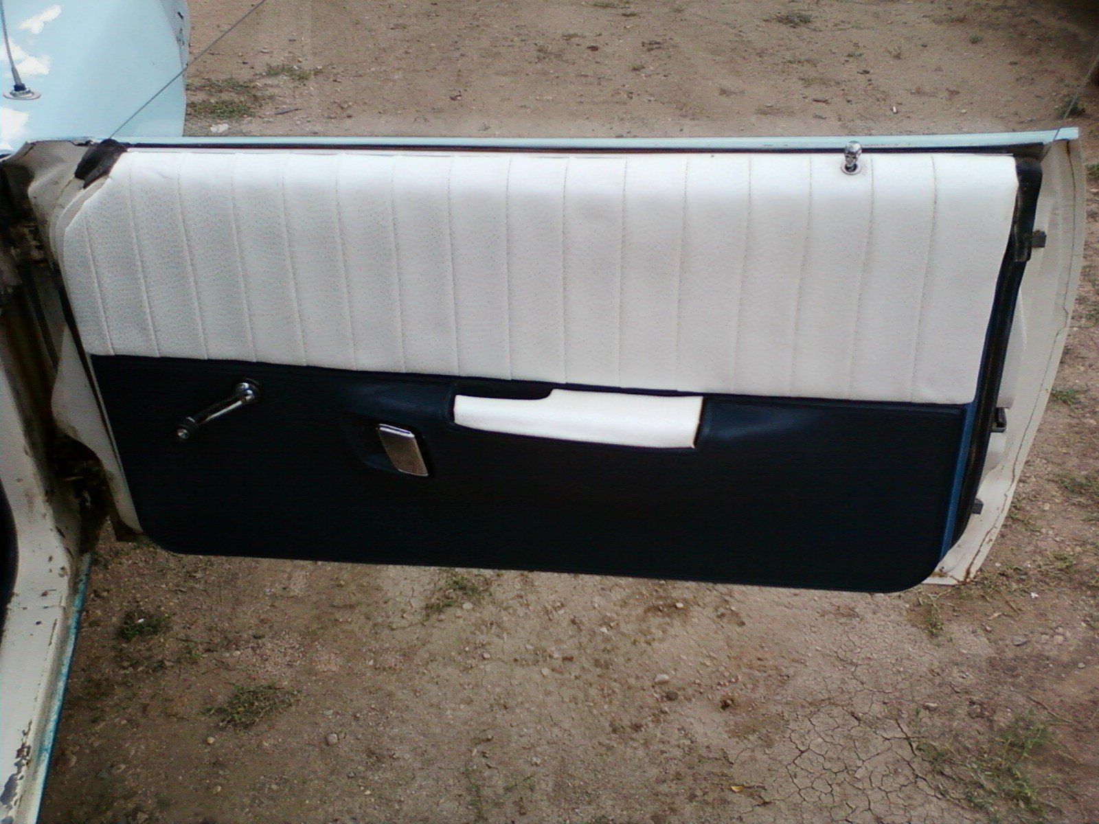 Black and White Car Door — Windsor, CO — A&F Custom Upholstery