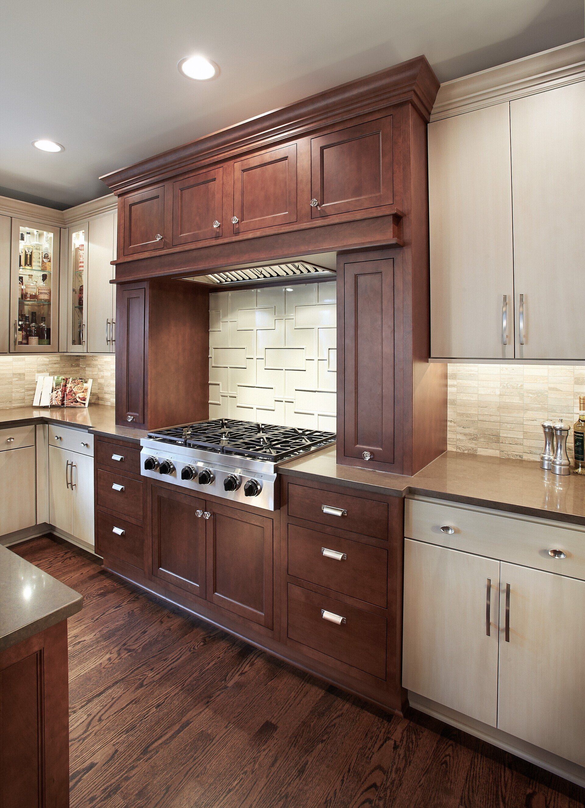 A kitchen with wooden cabinets and a stove top oven