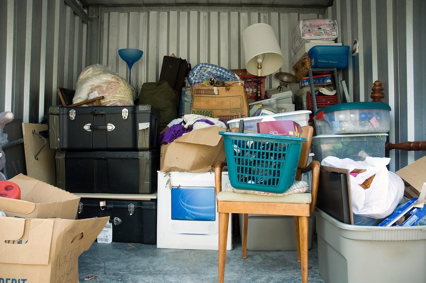A storage shed filled with lots of boxes and baskets