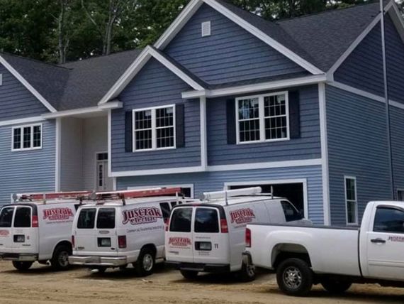 Business Vans Parked Near House — Pelham, NH — Jusczak Electric