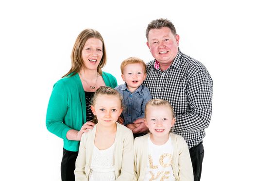 A family happy after a pre booking at a funeral home in Tararua