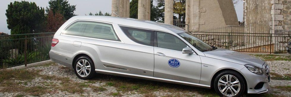 grey metallic funeral hearse