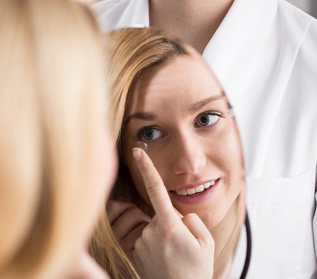 Woman Wearing Contact Lenses — Defiance, OH — Defiance Vision Care Woman Wearing Contact Lenses — Defiance, OH — Defiance Vision Care