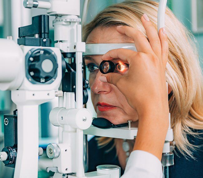 Senior Woman Eye Check-up — Defiance, OH — Defiance Vision Care Senior Woman Eye Check-up — Defiance, OH — Defiance Vision Care