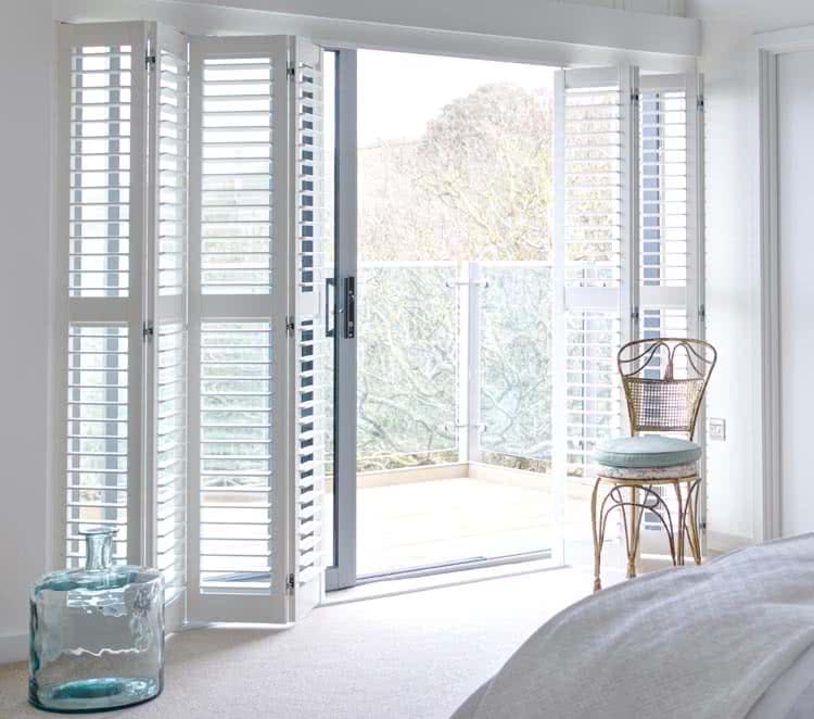 Bi-fold track shutters