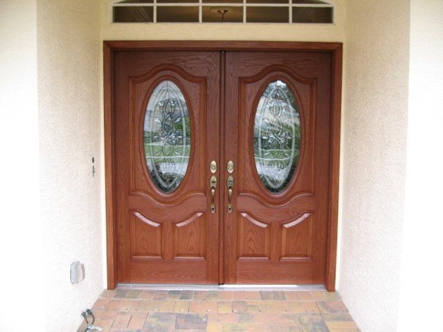 finished fiberglass front door with oval glass inserts