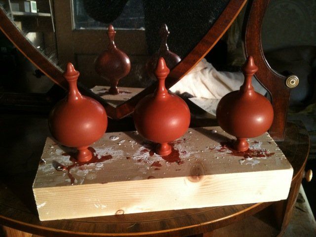 Clock finials being polished