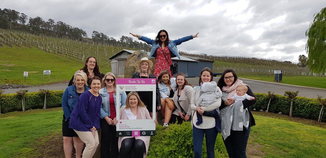 group of woman taking picture