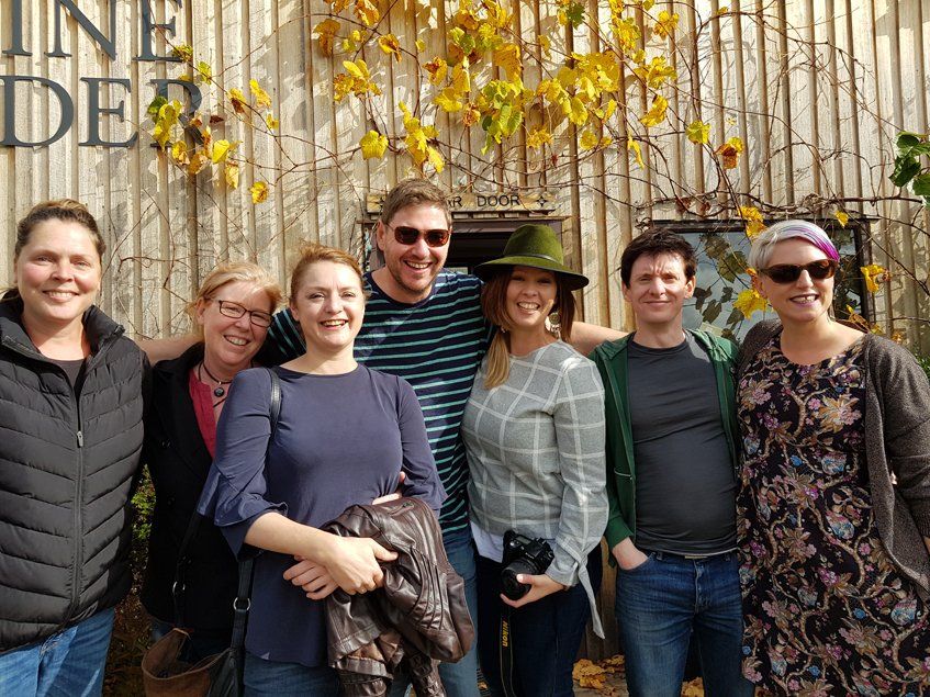 7 woman and 1 guys taking picture