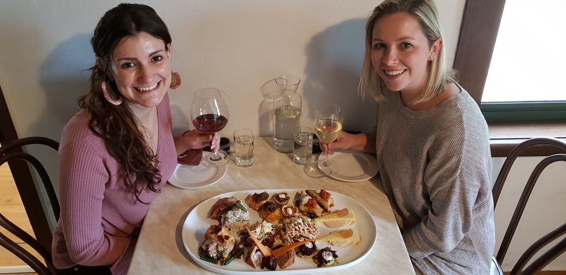 2 woman drinking wine