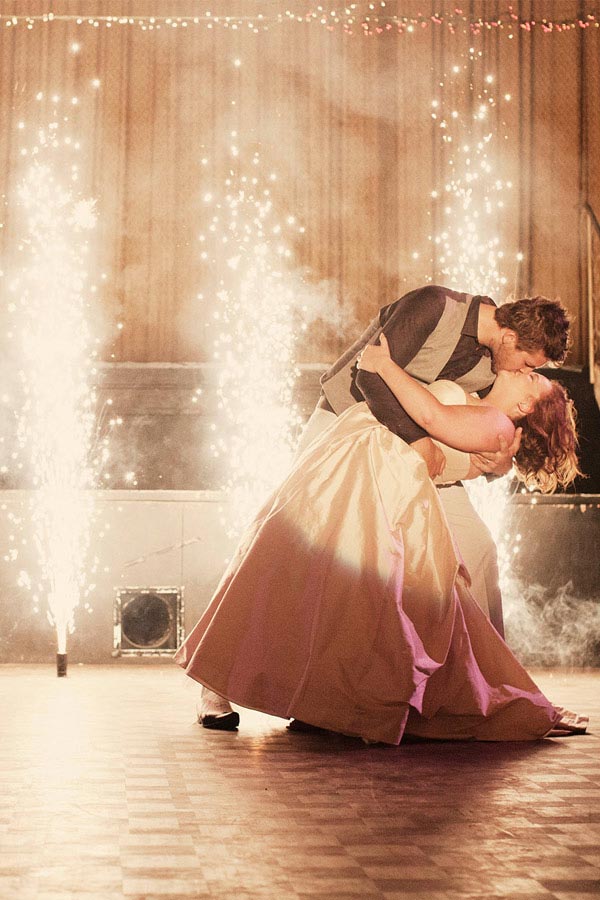 kc's fireworks indoor couple dancing infront of indoor fireworks