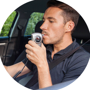 Man using breath analyzer — Legal Services in Brooklyn Center, MN Man using breath analyzer — Legal Services in Brooklyn Center, MN