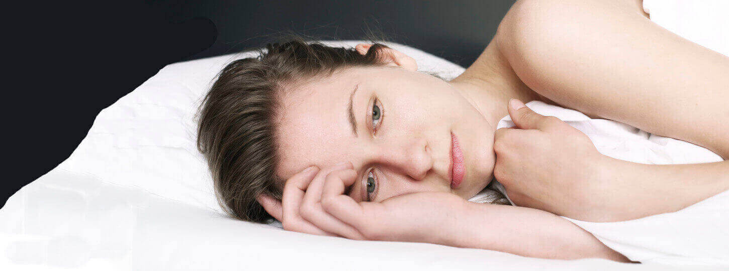 woman lying in bed cannot sleep