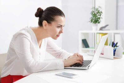 woman with poor sitting posture