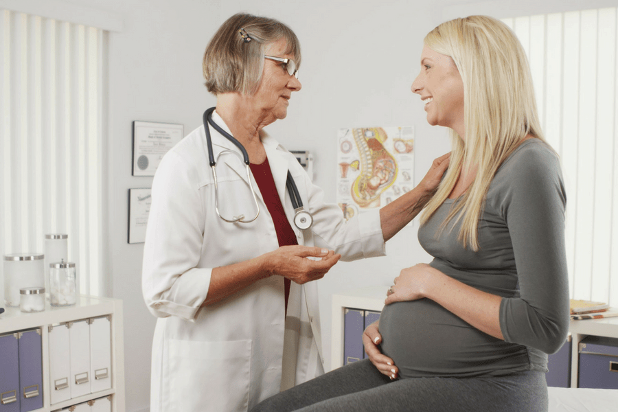 doctor and pregnant woman