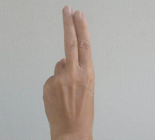 holding two fingers together