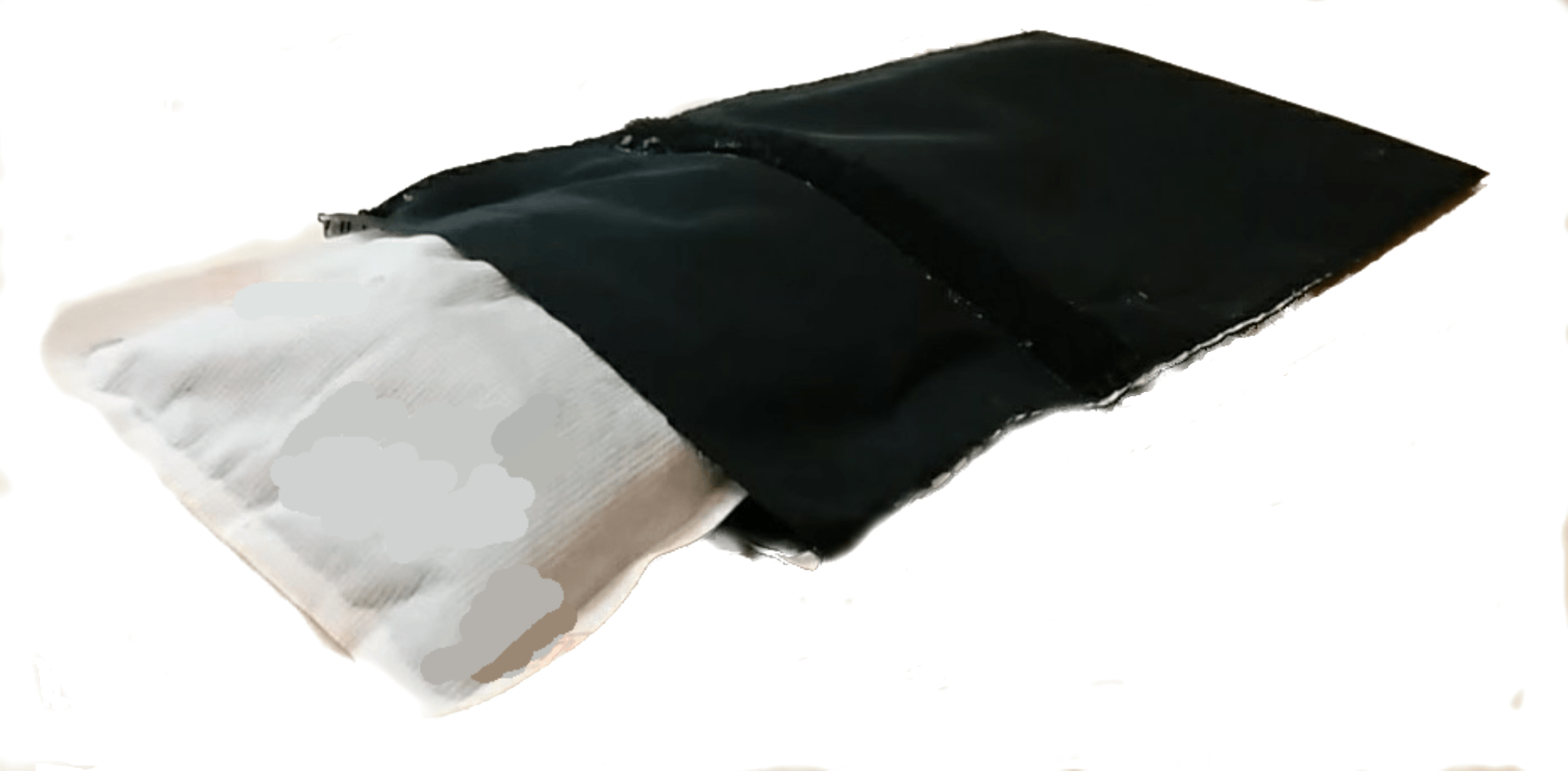 A black bag with a white pillow inside of it