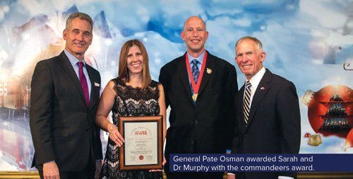 General Pate Osman awarded Sarah and Dr. Murphy with the commandeers award