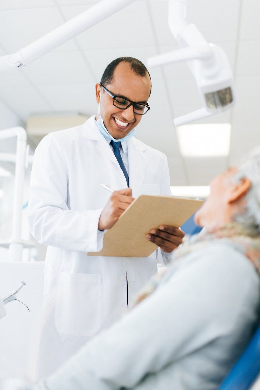dentist talking to patient about dental bonding