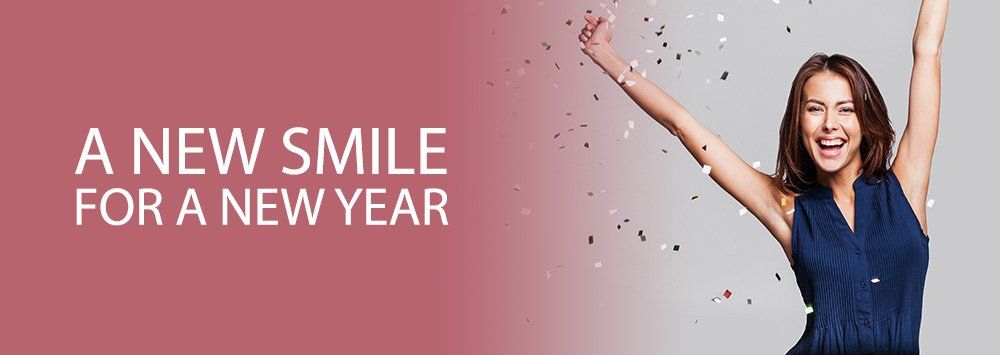 Cheerful woman with arms raised and confetti on the background, a new smile for the new year blog