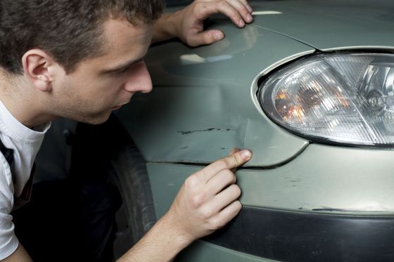 Mechanic working on collision repairs in Shelbina, MO